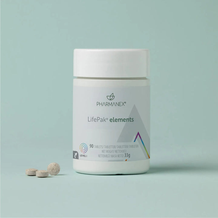 LifePak elements Dose mit zwei Tabletten auf mintgrünem Hintergrund